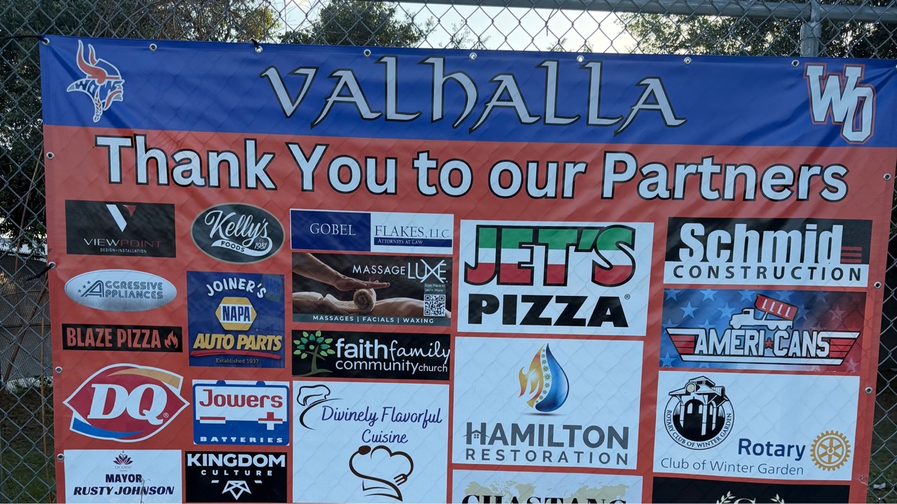 West Orange Warriors scoreboard and sponsor banners for the Silver Package